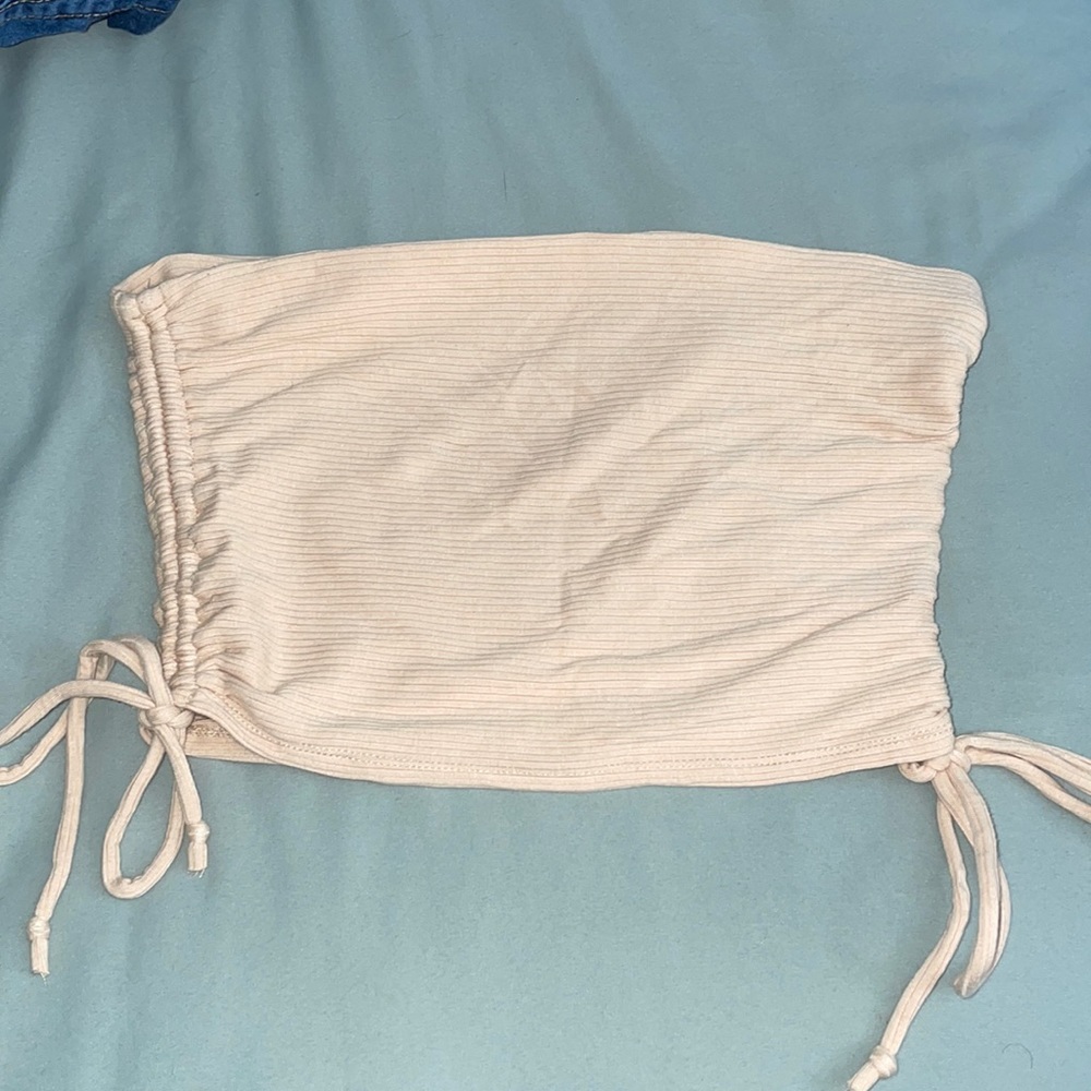 Light pink/nude strapless/tube top. Size S.